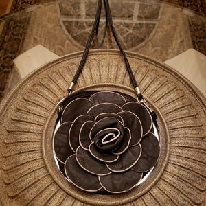 Rosette leather shoulder/crossbody bag.